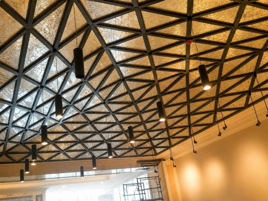 Geometric églomisé gold leaf glass ceiling panels, St. Regis Kuala Lumpur